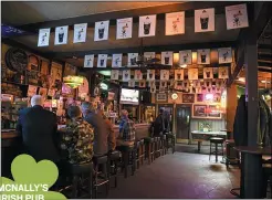  ?? JOSE CARLOS FAJARDO — STAFF PHOTOGRAPH­ER ?? Customers socialize and enjoy their drinks at the bar at Mcnally’s Irish Pub in Oakland.