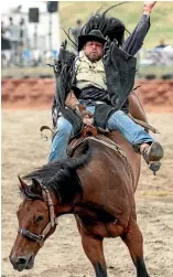  ??  ?? Supporters say rodeo pits a rider’s skill against animals.