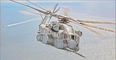  ?? Victoria Falcon / Naval Air Station Patuxent River ?? A pilot maneuvers Sikorsky’s new CH- 53K King Stallion helicopter over Chesapeake Bay during flight tests for aerial refueling in early April.