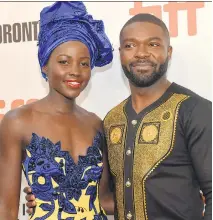  ?? WENN.COM ?? Lupita Nyong’o and David Oyelowo co-star in the chess-champion drama Queen of Katwe.