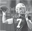  ?? ?? Ohio State quarterbac­k C.J. Stroud throws a pass during the first fall practice on Aug. 4 in Columbus, Ohio.