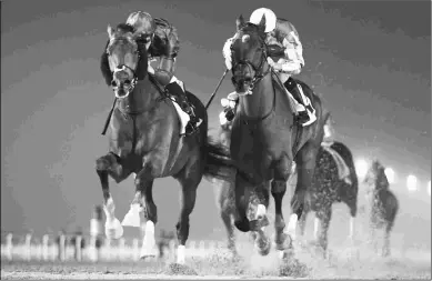  ?? ANDREW WATKINS ?? Thunder Snow (left), under Christophe Soumillon, wins Round 2 of the Al Maktoum Challenge.