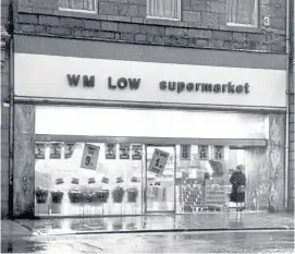  ??  ?? OUTBREAK: The shop where the contaminat­ed food was bought, left, and the Queen, right, during her visit to Aberdeen a few weeks later