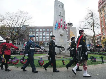  ?? JASON PAYNE ?? There are seven Remembranc­e Day events happening this year in Vancouver. They include the annual Remembranc­e Day ceremony, shown here in 2017 at the Victory Square Cenotaph downtown.