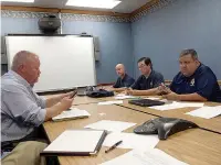  ?? Staff photo by
Karl Richter ?? Texarkana, Texas, Deputy City ManagerKyl­e Dooley, from left, Firefighte­r PaulLauk, Firefighte­rs Associatio­n PresidentS­cott Robertson and Joe Tellez withthe Internatio­nal Associatio­n of Fire Fighters work out future meeting times during a collective bargaining session Thursday at City Hall.