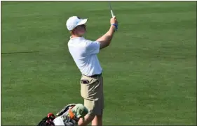  ?? PHOTO BY JOHN ZERWIN ?? Fairview’s Mathieu Zerwin follows through on a shot at Harmony Club on Tuesday in Fort Collins.