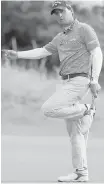  ??  ?? Kevin Kisner of the U.S. misses a putt on the 15th green during the second round of the British Open in Carnoustie, Scotland, on Friday.