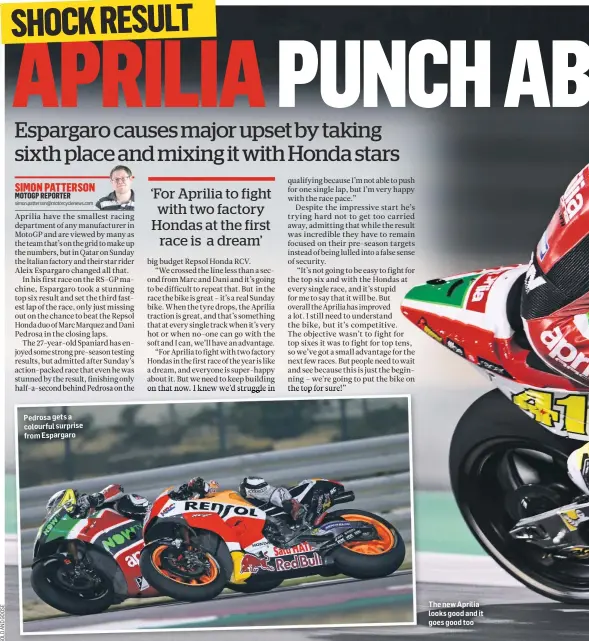  ??  ?? Pedrosa gets a colourful surprise from Espargaro The new Aprilia looks good and it goes good too