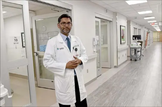  ?? Pam Panchak/ Post- Gazette ?? Dr. Imran Qadeer, chief medical officer of Allegheny General Hospital, at the hospital's new 20- bed patient observatio­n unit.