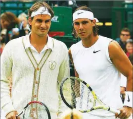  ??  ?? Roger Federer and Rafael Nadal posed for photograph after the epic 2008 Wimbledon final. Can they reenact the feat 10 years back?