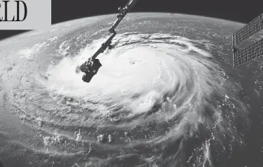  ?? NASA VIA AP ?? Hurricane Florence is seen on Monday from the Internatio­nal Space Station, as it barrels toward the U.S. East Coast.