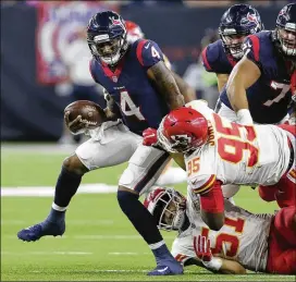  ?? TIM WARNER / GETTY IMAGES ?? Deshaun Watson (4) may have a higher fantasy value now, with injuries to Texans defenders putting more pressure on him to have big games.
