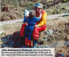  ??  ?? John Hemingway (Bultaco): John is greeted by his two young children Dan and Ben at the side of the road at the Kilmonivai­g hazards on the Tuesday.