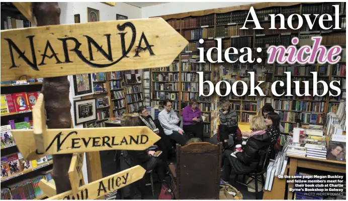  ?? PHOTO: ANDREW DOWNES ?? On the same page: Megan Buckley and fellow members meet for their book club at Charlie Byrne’s Bookshop in Galway