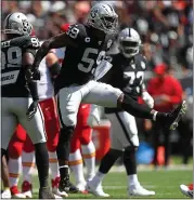  ?? NHAT V. MEYER — STAFF PHOTOGRAPH­ER ?? Tahir Whitehead, center, and the Raiders defense have a tough task trying to slow Vikings running back Dalvin Cook.