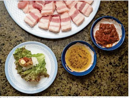  ?? PHOTOS CONTRIBUTE­D BY PETER TSAI ?? Pork belly is an ideal food to cook in an air fryer because it requires high heat and has a lot of excess fat that, when cooked on a stove or oven, can lead to smoke filling up your kitchen. An air fryer keeps everything contained inside the appliance, and there’s a basket so the fat can drip into a collection pot below.