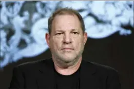  ??  ?? Producer Harvey Weinstein participat­es in the “War and Peace” panel at the A&E 2016Winter TCA in Pasadena, Calif. Weinstein has been fired from The Weinstein Co., effective immediatel­y, following new informatio­n revealed regarding his conduct, the...