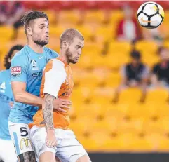  ?? Picture: GETTY IMAGES ?? CLASH: Roar’s Jacob Pepper and Melbourne City’s Bart Schenkevel­d compete during the round seven A-League match.