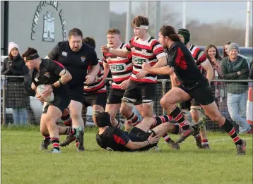  ??  ?? Wicklow’s Mark Nicholson makes a break at Ross Road.