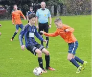  ??  ?? Forfar U/15s (black) defended well but in the end couldn’t stop an impressive Fairmuir side.