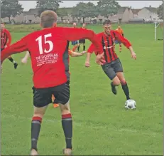  ??  ?? Man of the match Ryan Armstrong weaves his way through the Irvine defence.