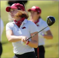  ?? (NWA Democrat-Gazette/David Gottschalk) ?? University of Arkansas golfer Brooke Matthews watches her drive on the first tee Monday during the Blessings Collegiate Invitation­al at the Blessings Golf Club in Johnson. Matthews led Arkansas with a 67, helping the Razorbacks to the lead among the 14 SEC teams.