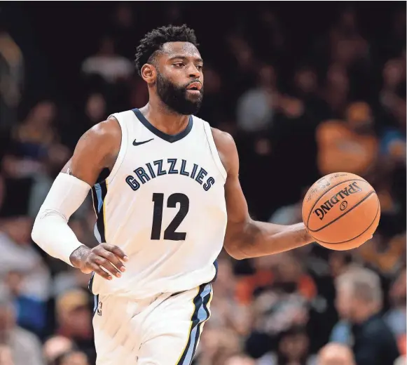  ??  ?? Guard Tyreke Evans (12) controls the ball in a Grizzlies game against the Denver Nuggets at the Pepsi Center. ISAIAH J. DOWNING/USA TODAY SPORTS