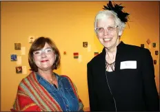  ?? NWA Democrat-Gazette/CARIN SCHOPPMEYE­R ?? Lynn Mahony (left) and Katherine Barnhart, 5x5 artists, visit at the Arts Center of the Ozarks benefit.