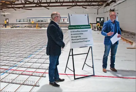  ?? SCOTT ANDERSON/SOUTHWEST BOOSTER ?? Swift Current MLA Everett Hindley and Swift Current Mayor Denis Perrault shared a Fairview Arena constructi­on update for the project which received $195,000 from the Municipal Economic Enhancemen­t Program (MEEP).