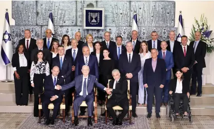  ?? (Marc Israel Sellem/The Jerusalem Post) ?? PRESIDENT REUVEN RIVLIN and the 36th Government pose for the traditiona­l photograph at the President’s Residence yesterday.
