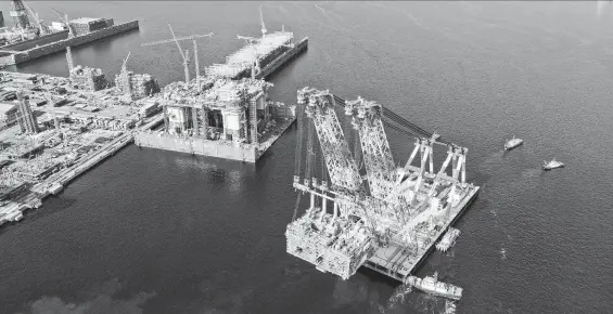  ?? BP ?? BP’s Argos platform, built in South Korea, is the centerpiec­e of its $9 billion Mad Dog Phase 2 project and will begin oil production in the deepwater Gulf in 2021.