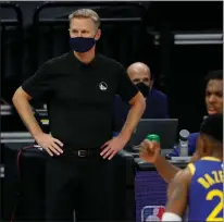  ?? Tribune News Service/bay Area News Group ?? Golden State Warriors head coach Steve Kerr coaches from the sidelines against the Sacramento Kings in the fourth quarter at the Golden 1 Center in Sacramento in December 2020.