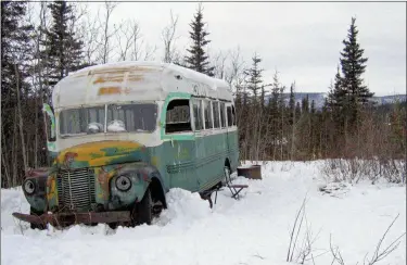  ?? AP PHOTO ?? This March 21, 2006, file photo, shows the abandoned bus where Christophe­r McCandless starved to death in 1992 on Stampede Road near Healy, Alaska. For more than a quarter-century, the old bus abandoned in Alaska’s punishing wilderness has drawn adventurer­s seeking to retrace the steps of a young idealist who met a tragic death in the derelict vehicle.
