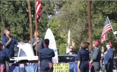  ??  ?? Las Comadres’ Rosie the Riveters give the Pledge of Allegiance at the Fourth annual Holtville Veterans Day Parade on Saturday. WILLIAM ROLLER PHOTO