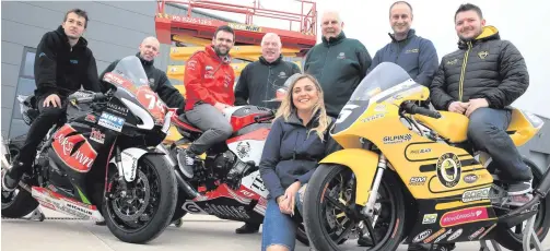  ??  ?? Revved up: Launching the KDM Hire Cookstown 100 are Daniel Mettam from New Zealand, who will make his debut at the Co Tyrone races this year, and William and Gary Dunlop. Also included are KDM Hire’s Rebecca Carson and Alan Gillis alongside Cookstown Club’s John Dillon, deputy clerk of the course Kenny Loughrin and Norman Crooks