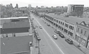  ?? SENTINEL MIKE DE SISTI AND CHELSEY LEWIS / MILWAUKEE JOURNAL ?? An aerial view from a drone of Dr. Martin Luther King Drive looking south from West Brown Street in Milwaukee