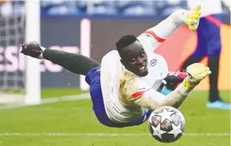  ?? PIERRE-PHILIPPE MARCOU/AFP VIA GETTY IMAGES ?? Goalkeeper Edouard Mendy, seen training on Friday, and his Chelsea side face Manchester City this afternoon in the UEFA Champions League final.