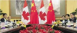  ?? MARK SCHIEFELBE­IN-POOL / GETTY IMAGES ?? A Chinese-Canadian businessma­n is fighting allegation­s that he spied for China, in a case that illustrate­s the Chinese “vacuum cleaner” approach to intelligen­ce gathering.