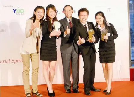  ??  ?? Team Ecocell with their trophies after winning the regional finals of the HSBC Young Entreprene­urs Developmen­t Council (YDC) Young Entreprene­ur Challenge (YEC) 2012.