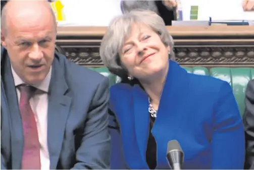  ??  ?? Undignifie­d departure: Prime Minister Theresa May with Damian Green, whom she was forced to sack as her deputy this week