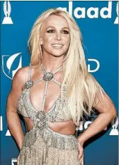  ?? CHRIS PIZZELLO/INVISION 2018 ?? Pop singer Britney Spears has released the bonus track “Mood Ring (By Demand)” to streaming services.