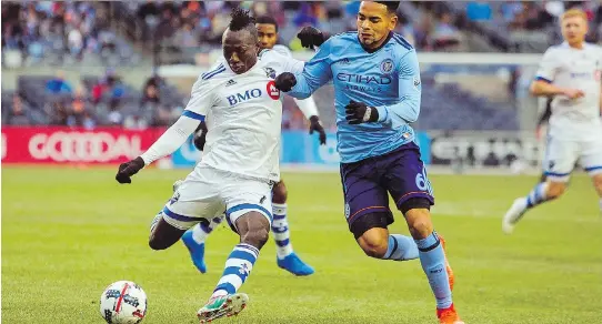  ?? ANDRES KUDACKI/THE ASSOCIATED PRESS ?? Dominic Oduro, left, is the favourite to move into the striker’s spot from right wing after Matteo Mancousu suffered a thigh injury.