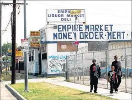  ?? Al Seib Los Angeles Times ?? EMPIRE LIQUOR Market and Deli in 1992. The year before, the store’s owner accused Latasha Harlins, 15, of theft. Latasha was killed in the ensuing struggle.