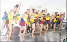  ?? ?? Sibhaca dance by the Umbutfo Eswatini Defence Force group. (Inset) Imbali from the UEDF in full swing.