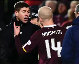  ??  ?? Rangers manager Steven Gerrard argues with Steven Naismith