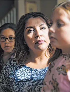  ?? Rachel Aston Las Vegas Review-journal @rookie__rae ?? Adriana May-azuero and her children Sophia May, 11, left, and Jaise May, 7, at their home July 26 in Las Vegas. The furloughed single mother has yet to see jobless payments.