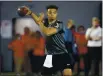  ?? PAUL VERNON — THE ASSOCIATED PRESS ?? Ohio State quarterbac­k Justin Fields throws during his pro day on March 30 at Ohio State University in Columbus, Ohio.