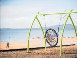  ?? PHOTO / MICHAEL CRAIG ?? A children’s playground in Auckland taped off during the latest lockdown.