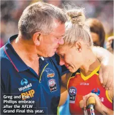  ??  ?? Greg and Erin Phillips embrace after the AFLW Grand Final this year.