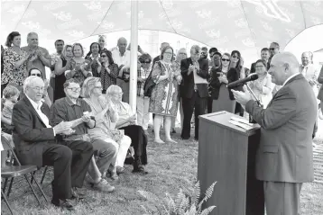  ?? Submitted photo ?? ■ Dr. Trey Berry, president of Southern Arkansas University, speaks Monday at the groundbrea­king for a new residence hall at SAU. Pictured are, left to right: Dr. Bob Burns, chairman of Farmers Bank & Trust, Lawrence Bearden, secretary, SAU Board of...